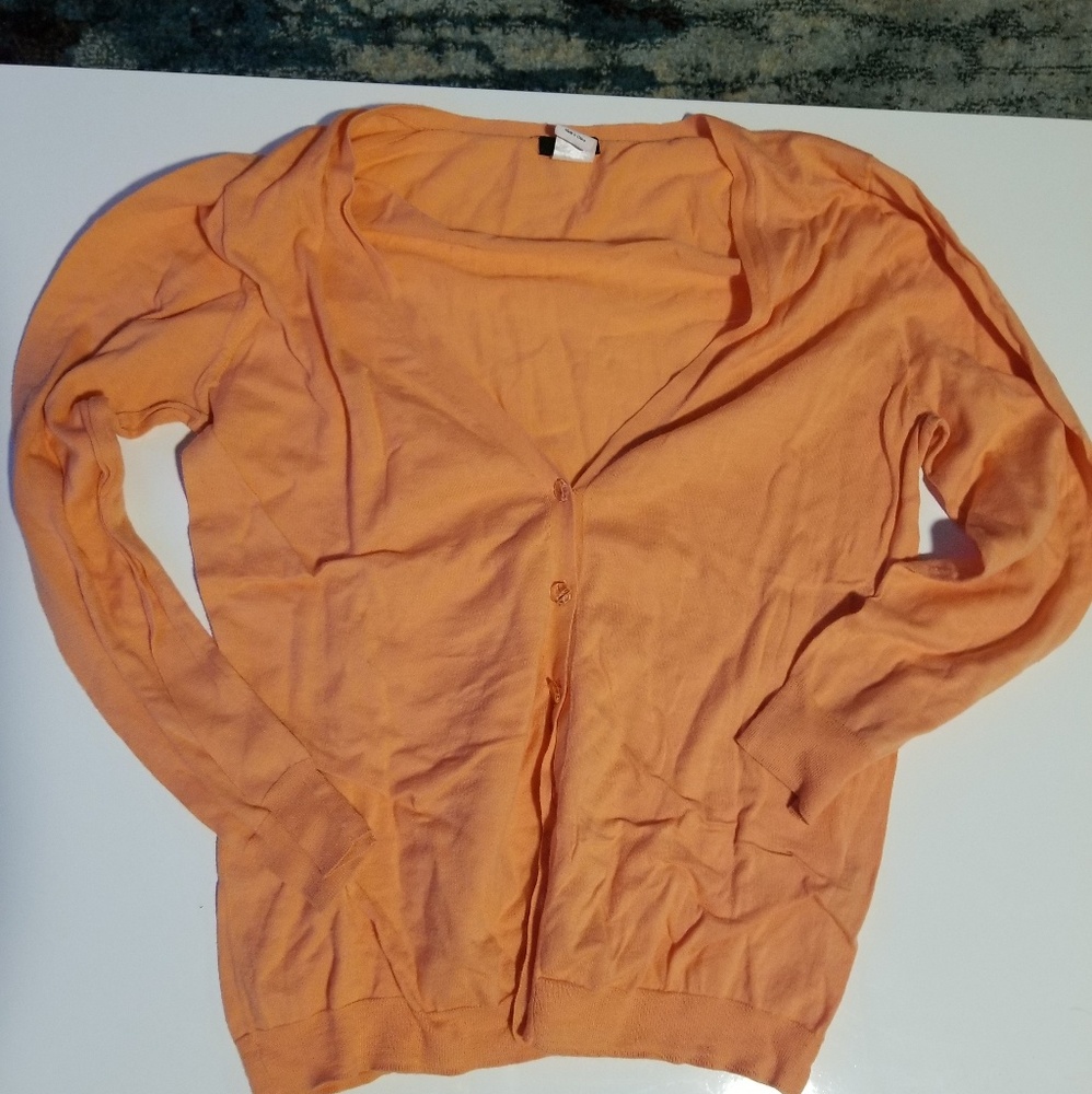 Peachy / pastel orange cardigan